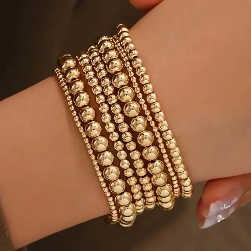 ✨ 7Pcs Luxury Gold Beaded Bracelet Set – Flexible, Stylish & Perfect for Daily Wear